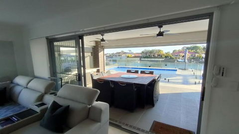 Relax Poolside By The Canal - Accommodation Port Hedland 0